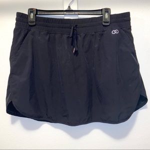Calia athletic mini tennis skort black size XL black drawstring sporty skirt